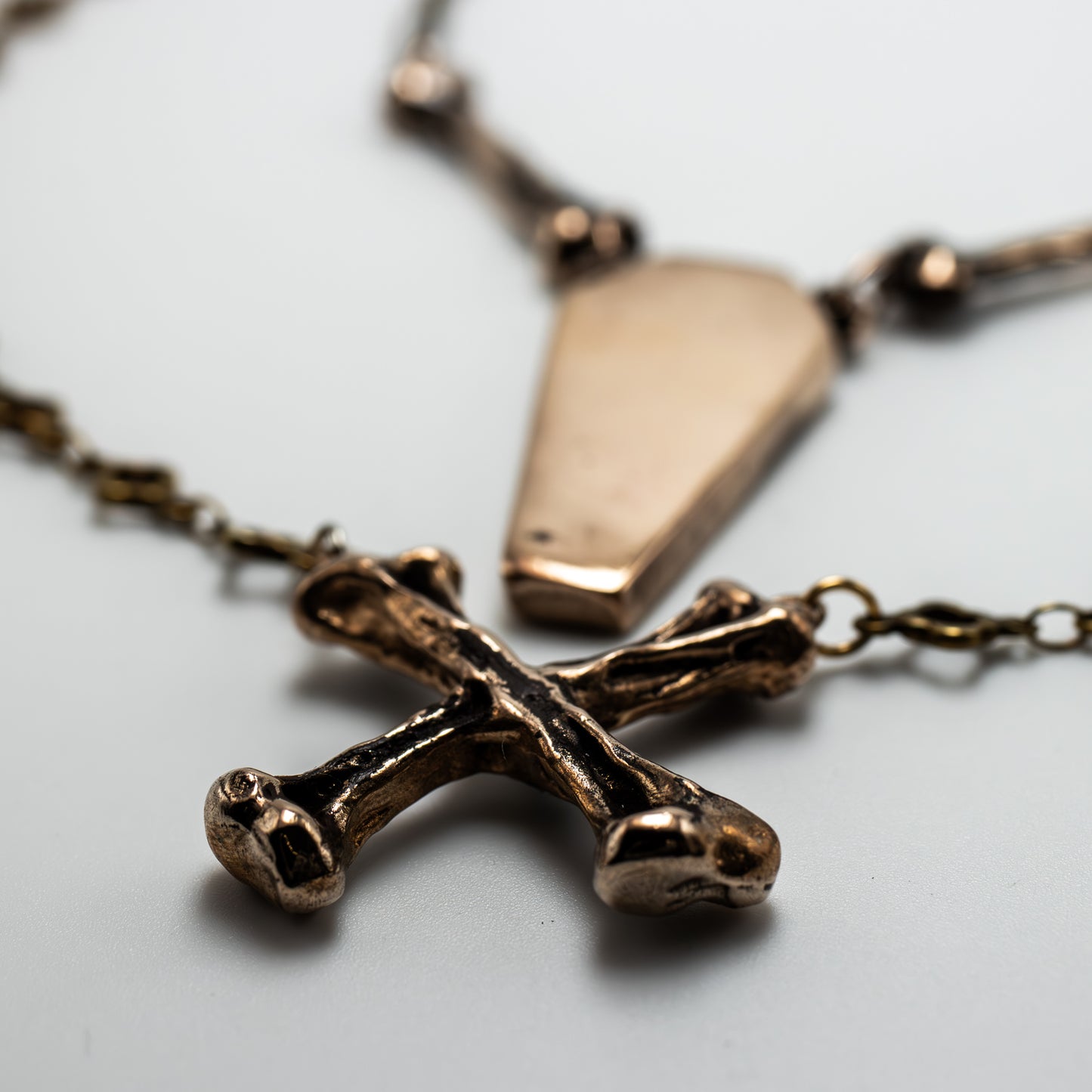 CROSSBONE IN BRONZE
