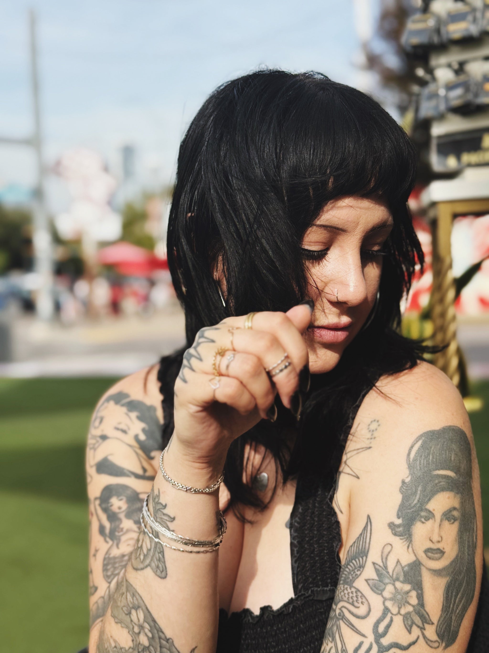 Woman wearing handmade stacking rings and permanent bracelets on South Congress in Austin, Texas by House of Eberstein