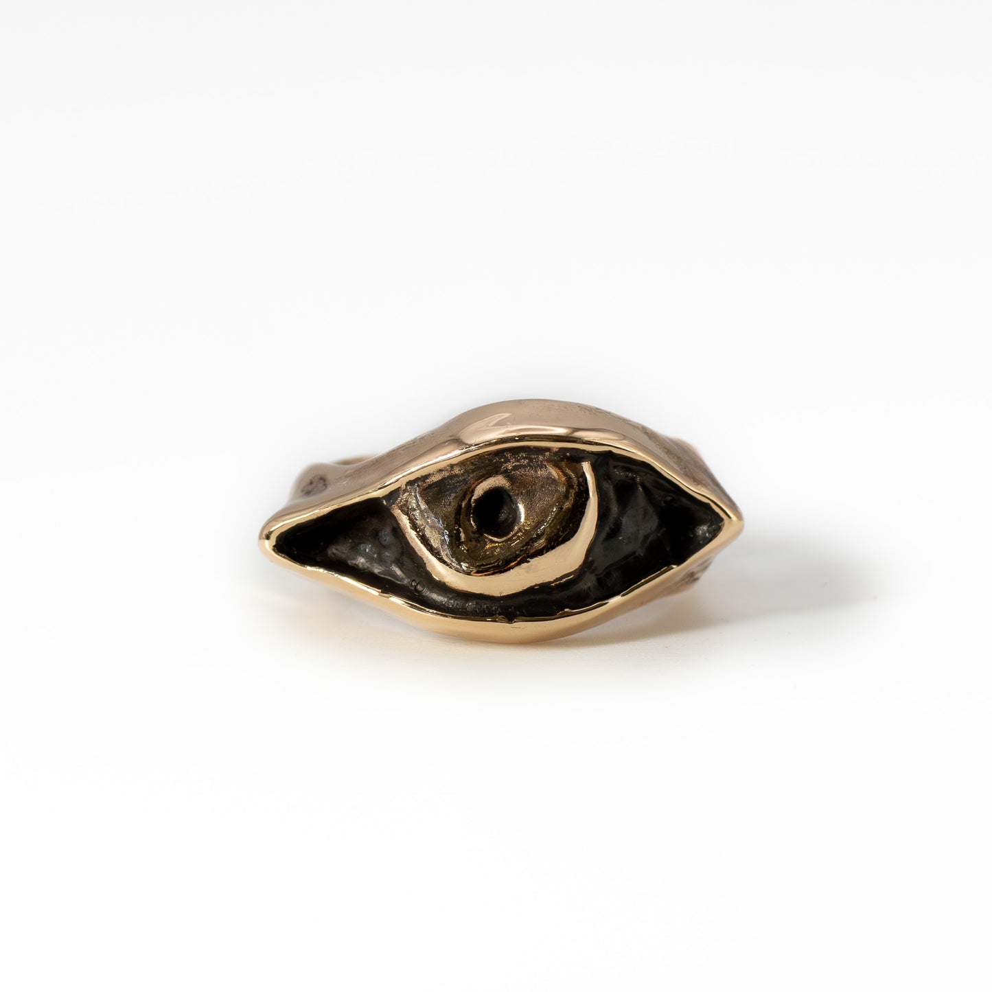 Front view of cast bronze Evil Eye ring, handmade protective talisman jewelry from Austin