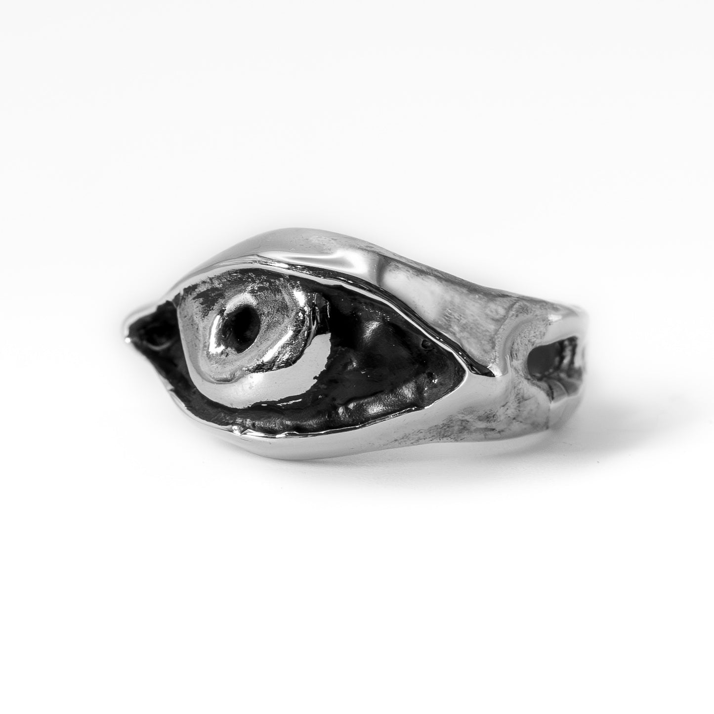 Angle view, Cast silver Evil Eye ring photographed at an angle, handmade protective talisman jewelry