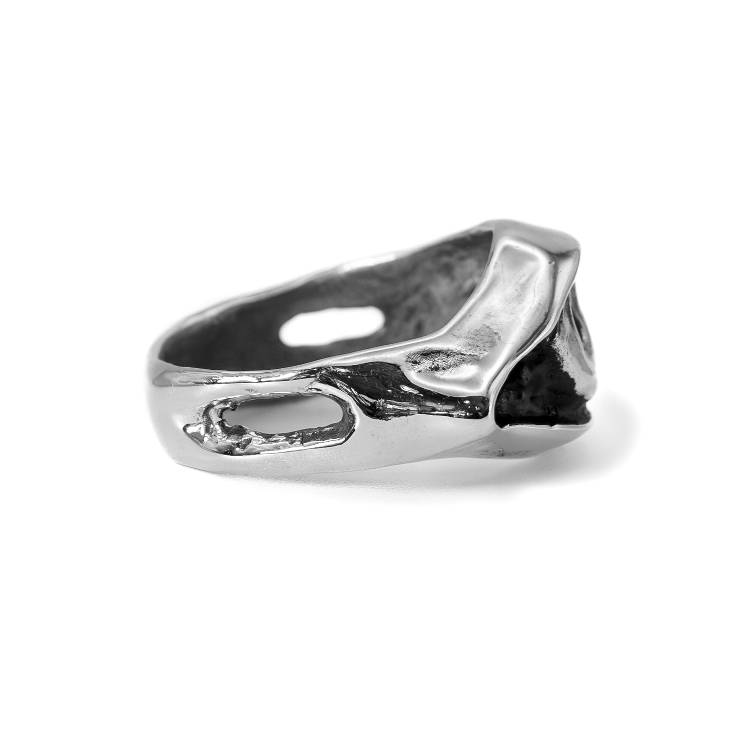 Side profile of cast silver Evil Eye ring, handcrafted statement jewelry with talisman design