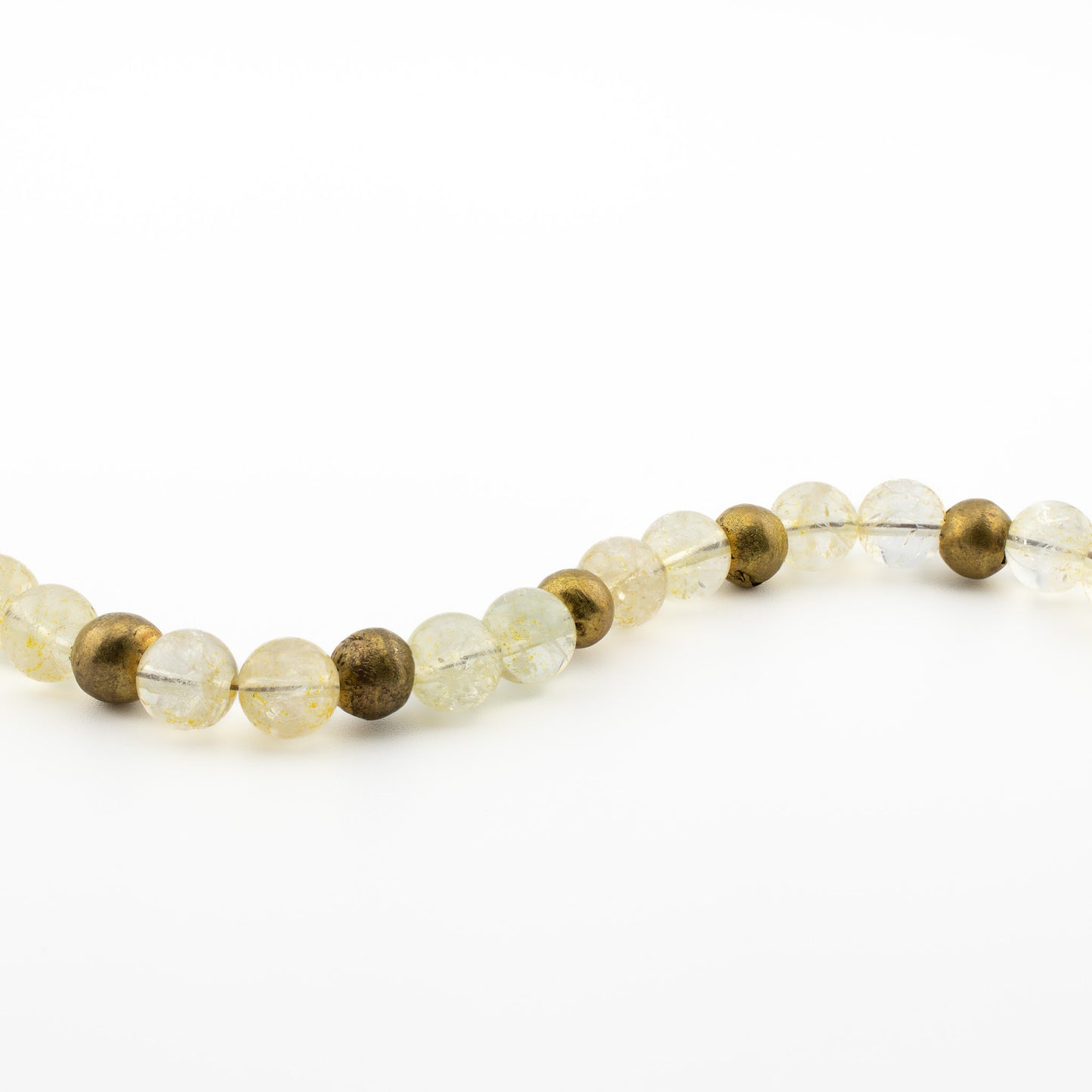Meditation and yoga jewelry featuring a Citrine Yoga Bracelet with citrine stones, brass beads, and bronze hardware.