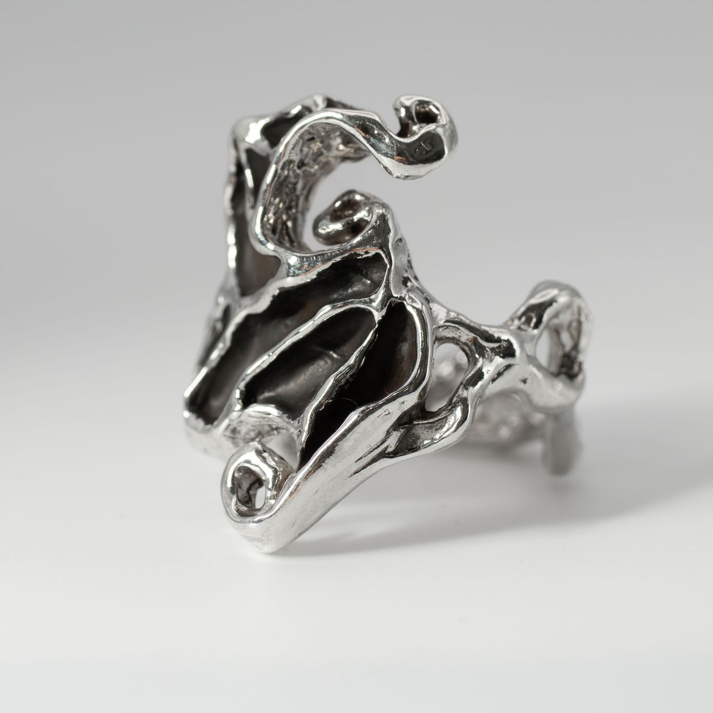 Angled view of sterling silver Dark Crystal Ring, funky handmade jewelry crafted in Austin, Texas