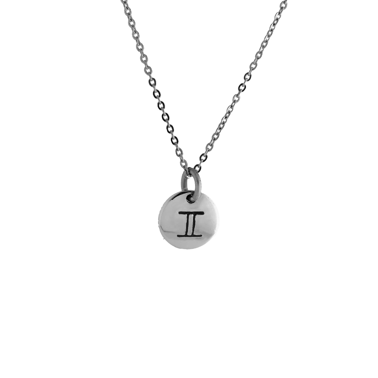 A silver necklace with a circular charm featuring the symbol for Gemini.