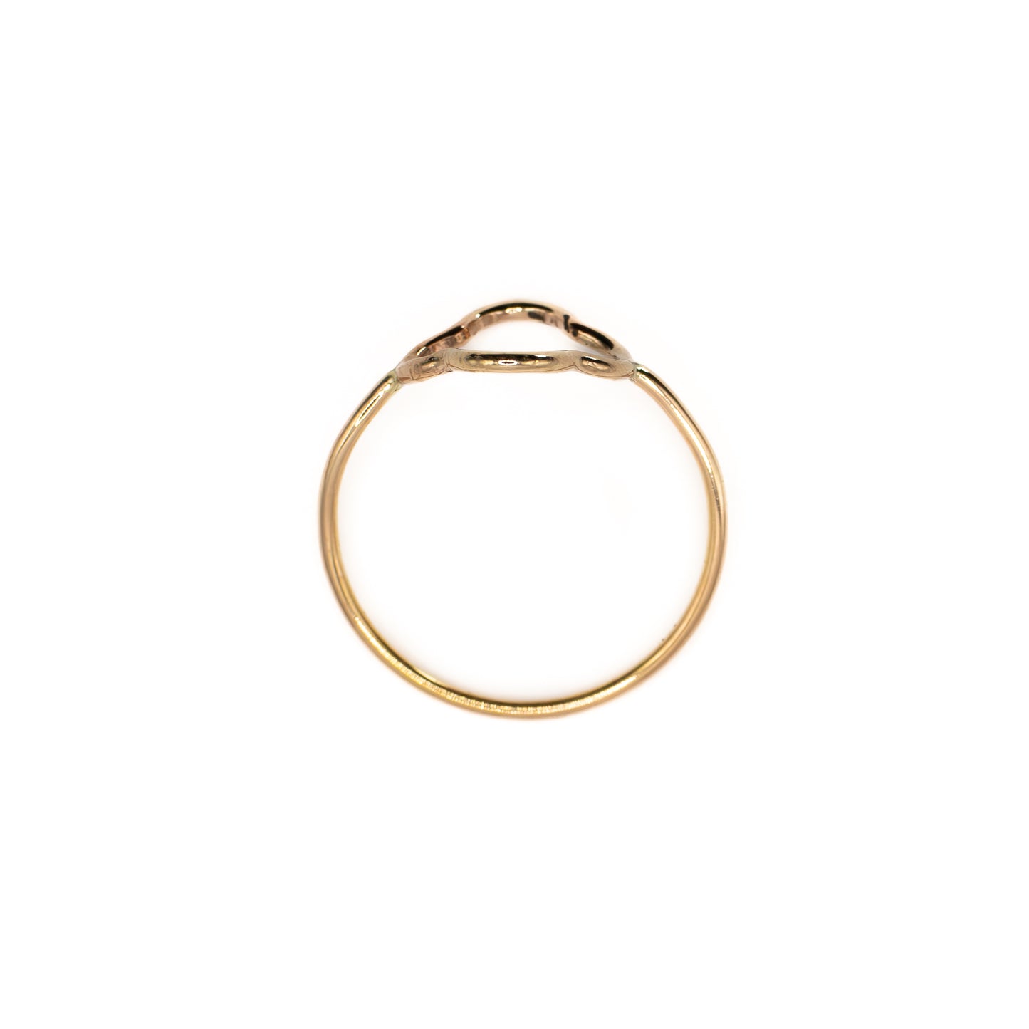 Overhead angle of minimalist gold flower ring, 14k gold-filled floral stacking jewelry
