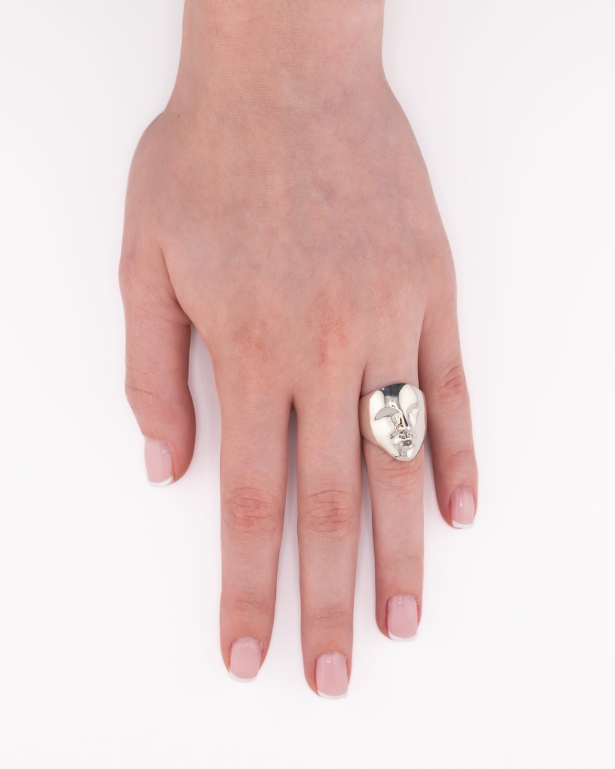 Mother Ring in sterling silver worn on hand model white background