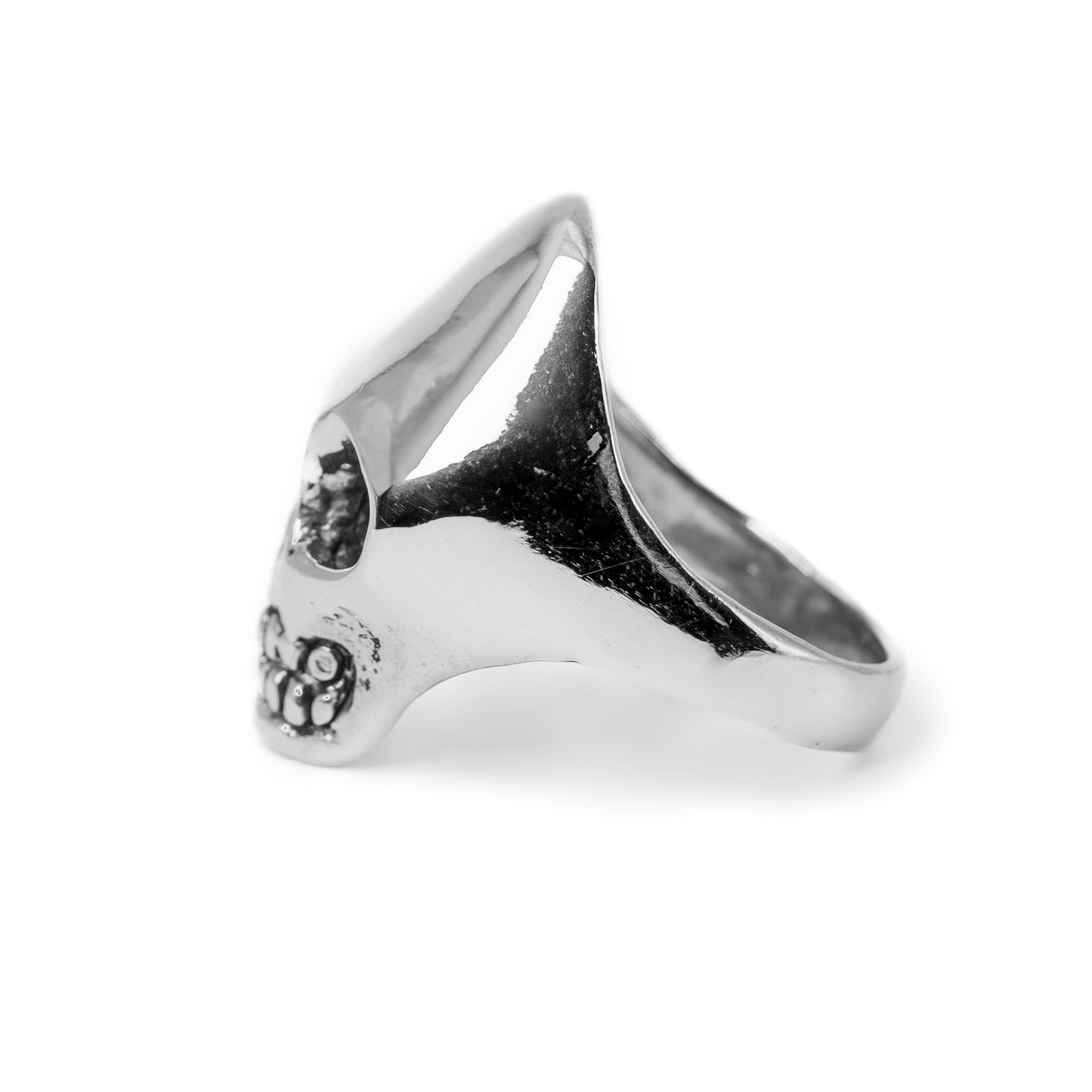 Skull ring in solid sterling silver side view handmade in austin texas.