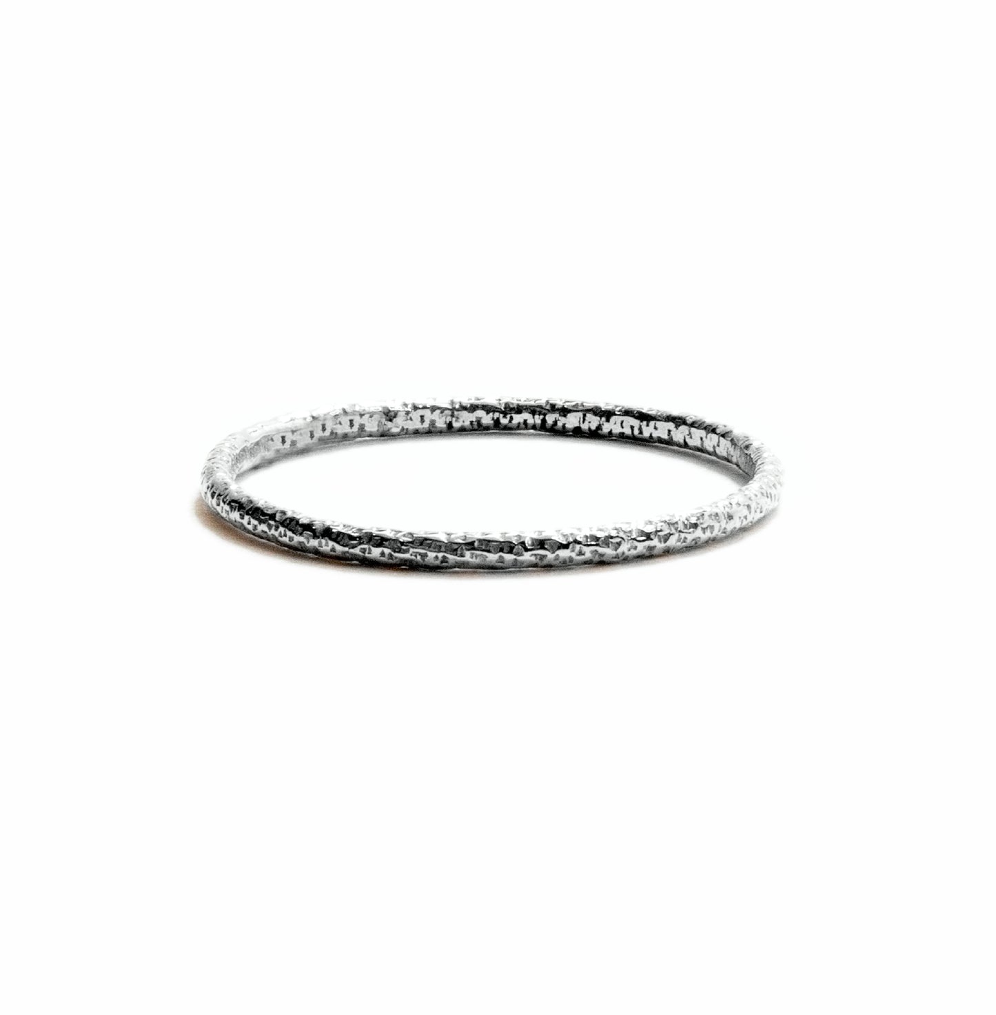 Tiny Sparkle stacking ring in sterling silver, elegant waterproof design handmade in Austin