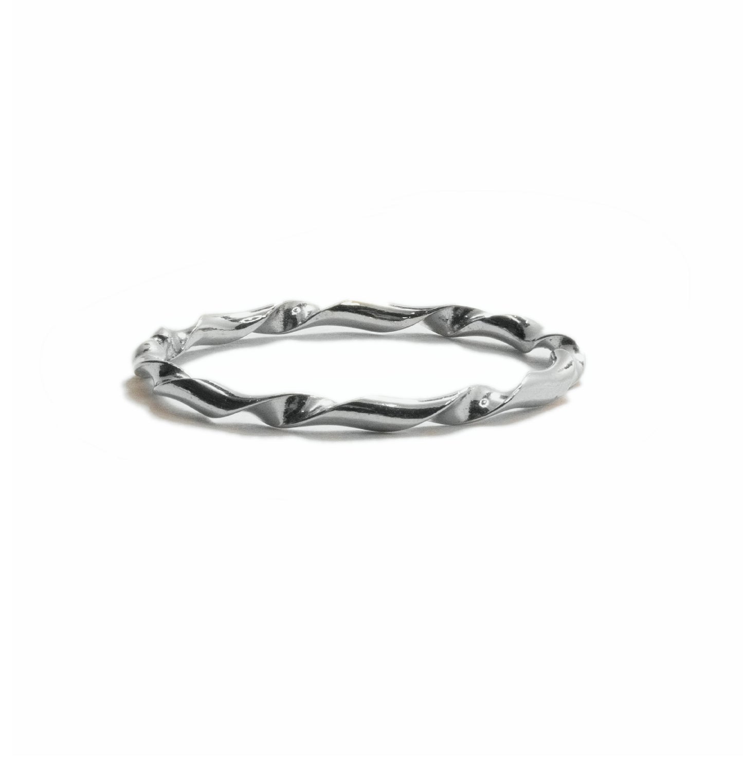 Tiny Twist stacking ring in sterling silver, dainty twisted design handmade in Austin