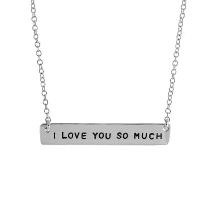 silver stamped necklace with 'I love you so much' stamped on the pendant handmade austin texas
