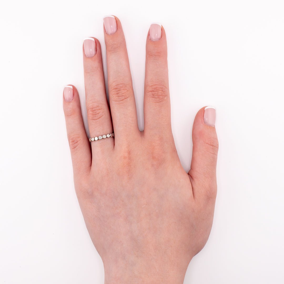 Sterling silver Big Bubbles stacking ring on hand, durable waterproof ring for pinky, midi, or thumb wear