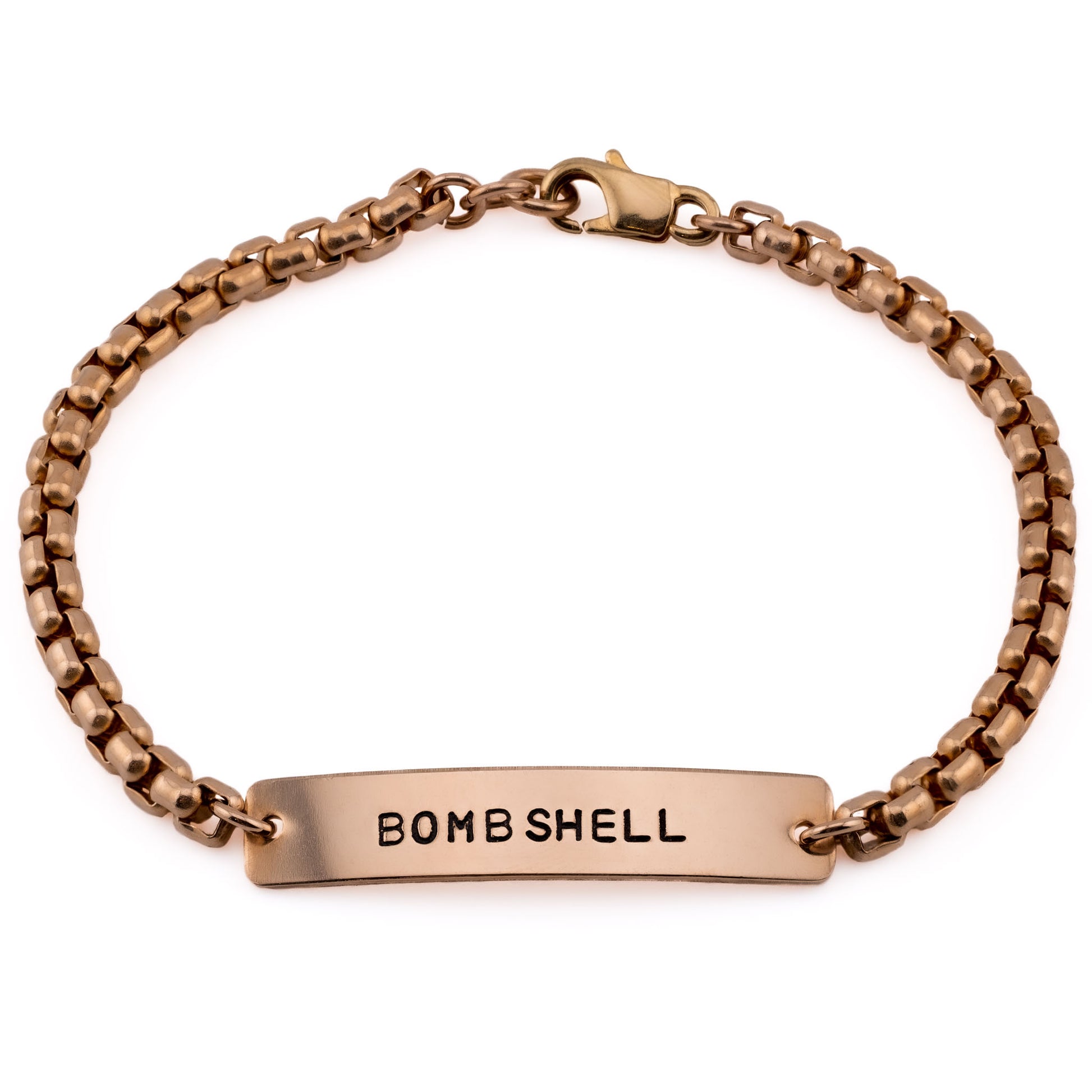 Hand-stamped bronze bracelet with Bombshell design, handmade in Austin Texas