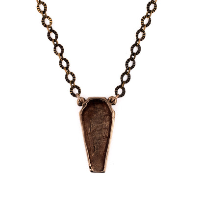 COFFIN IN BRONZE