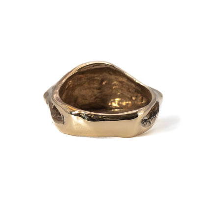 Back view of cast bronze Evil Eye ring, handmade jewelry with organic sculpted finish