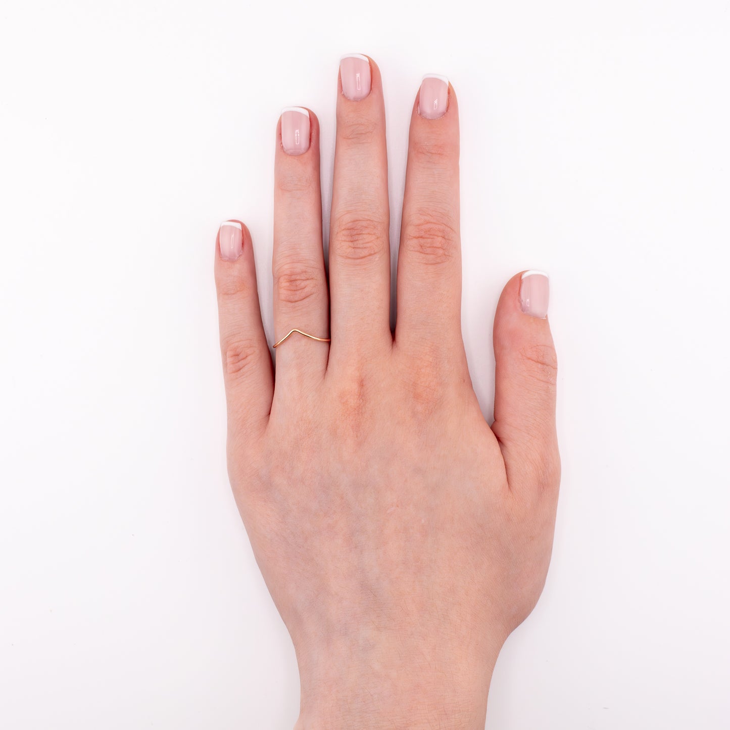 14k gold-filled chevron stacking ring on hand model, handmade minimalist jewelry for layering