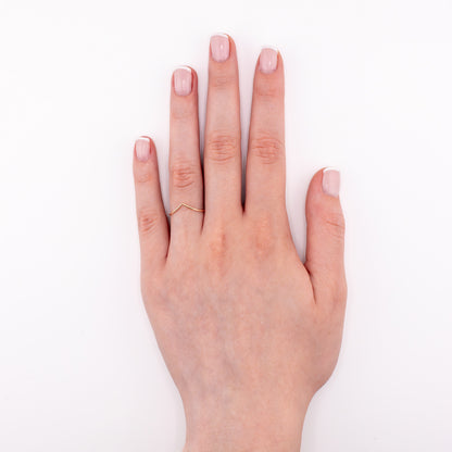 14k gold-filled chevron stacking ring on hand model, handmade minimalist jewelry for layering