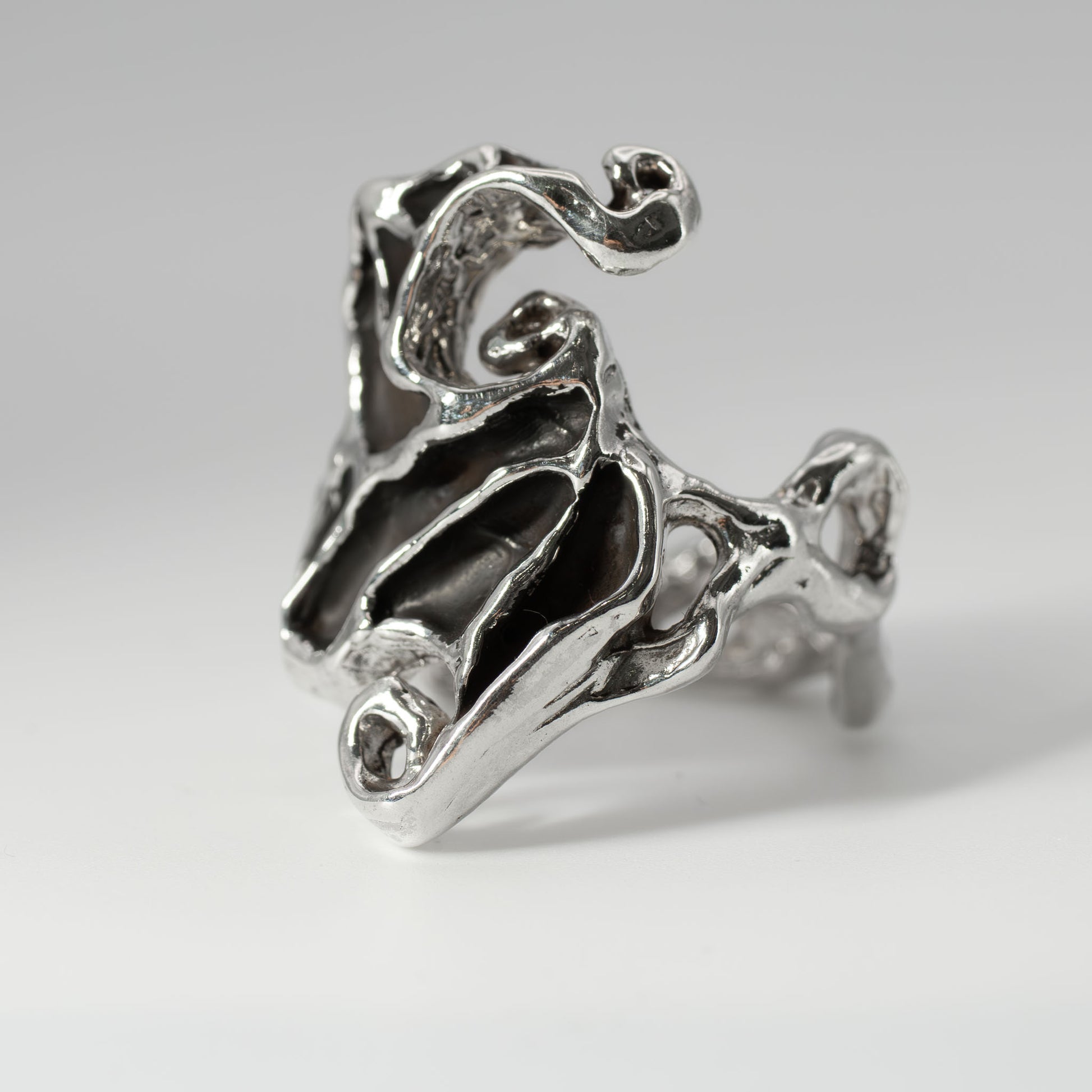 Angled view of sterling silver Dark Crystal Ring, funky handmade jewelry crafted in Austin, Texas