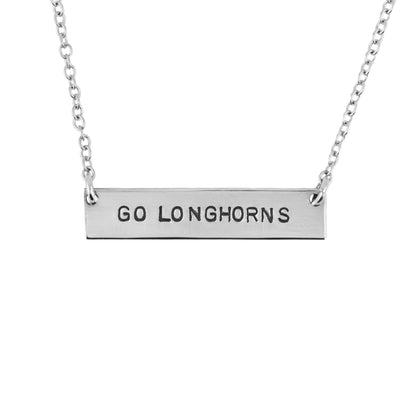 SIlver necklace with 'GO LONGHORNS' pendant on a white background