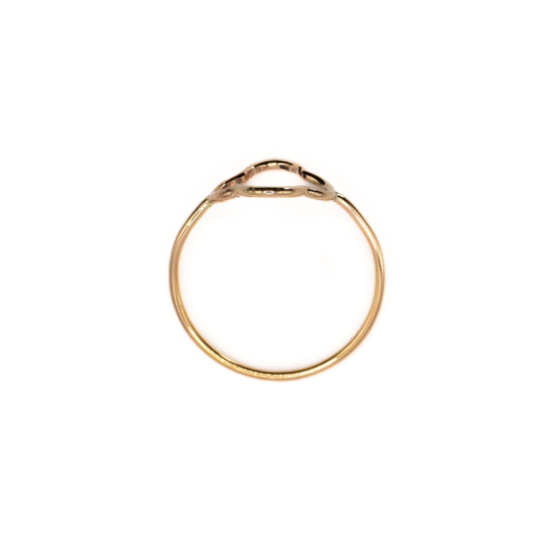 Overhead angle of minimalist gold flower ring, 14k gold-filled floral stacking jewelry