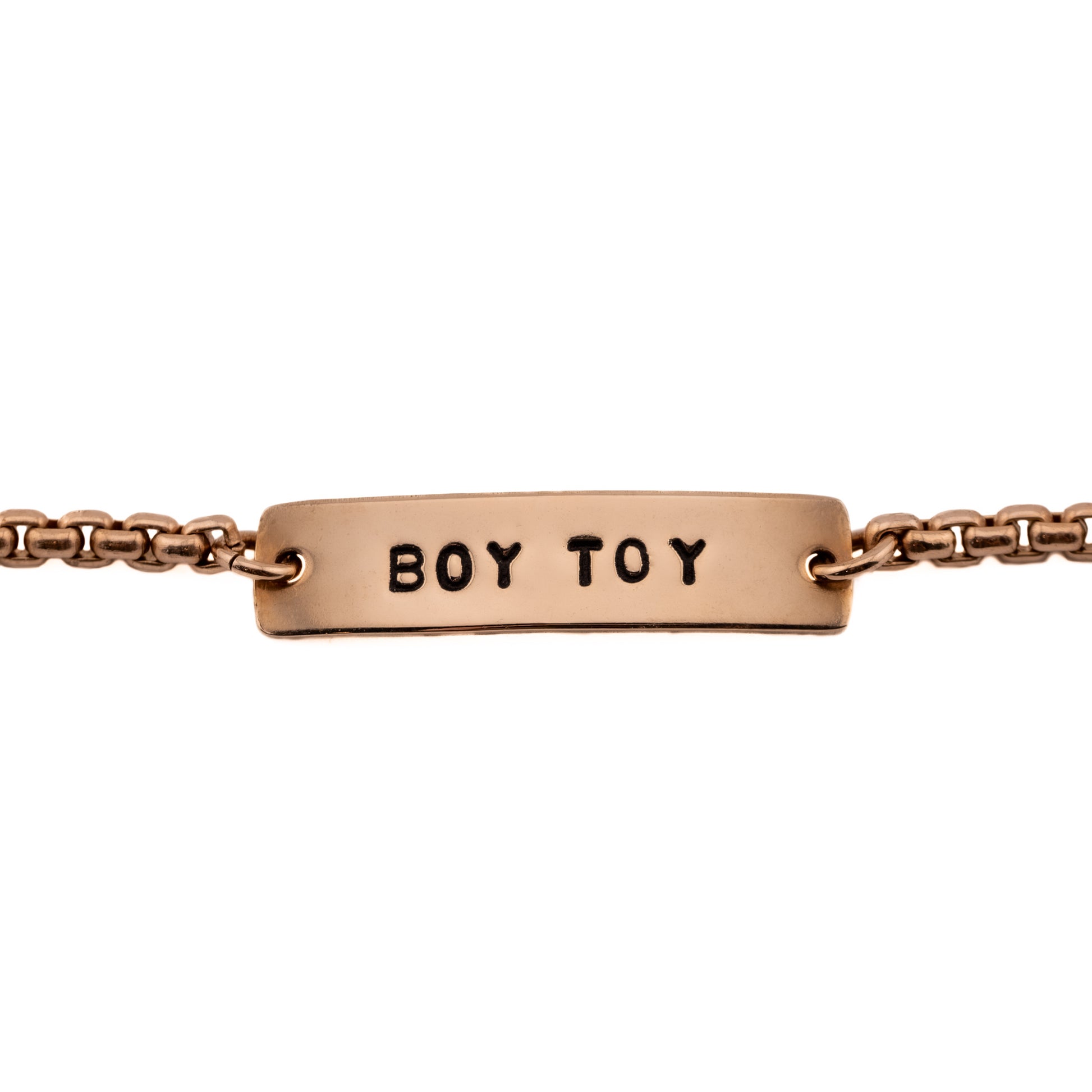 Bronze stacking bracelet stamped Boy Toy, queer pride jewelry
