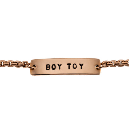 Bronze stacking bracelet stamped Boy Toy, queer pride jewelry