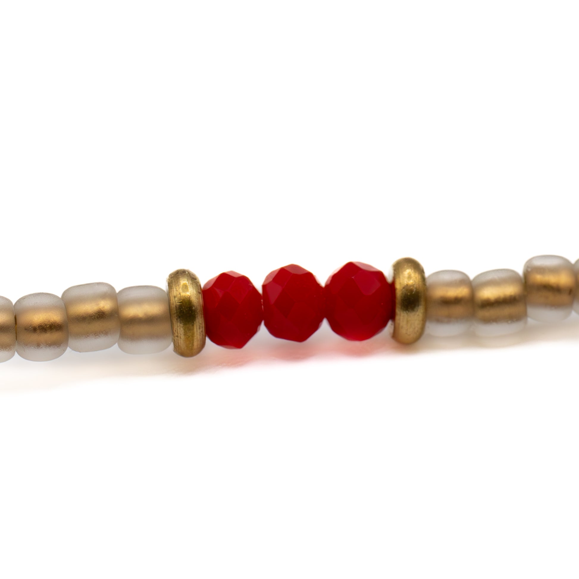 Glass seed bead anklet in tan gold and bold red, handmade jewelry gift for her from Austin up close.