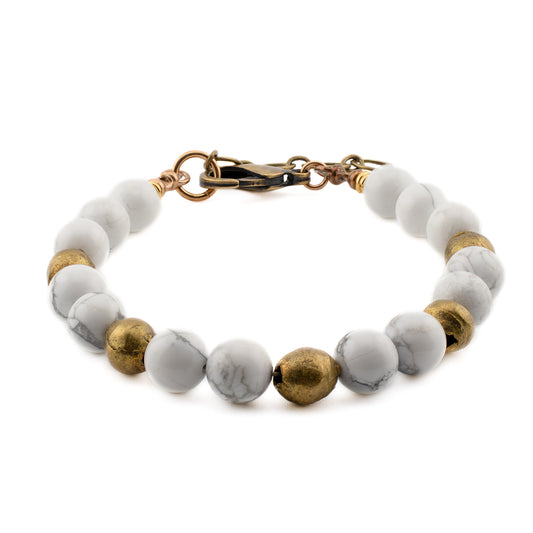 Front view of handmade Howlite Yoga Bracelet with natural white stones and brass beads, crafted in Austin, Texas.