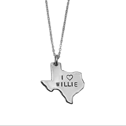 Silver necklace with a Texas-shaped pendant that reads 'I ❤️ WILLIE'.