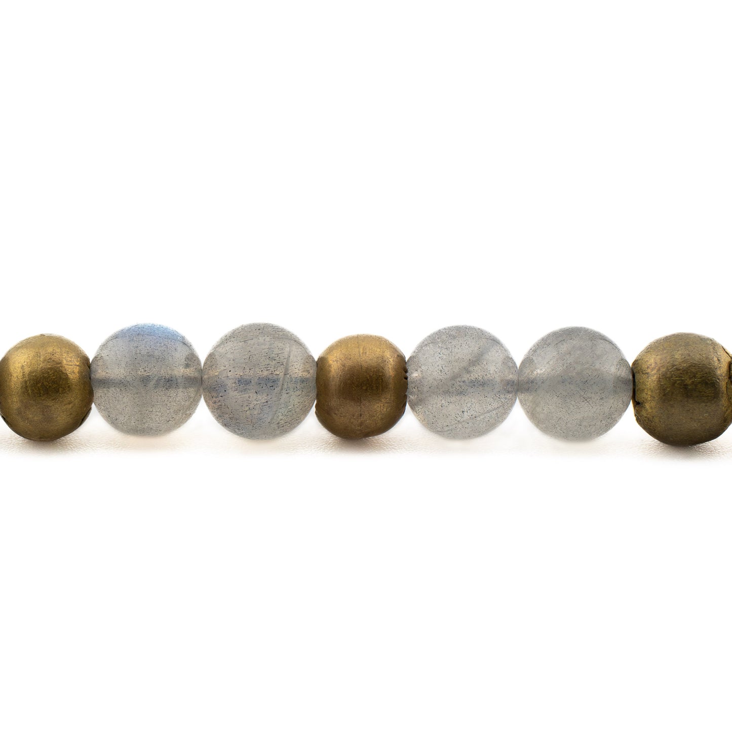 Close-up of shimmering labradorite beads with blue and green flashes, meditation bracelet handmade in Austin.