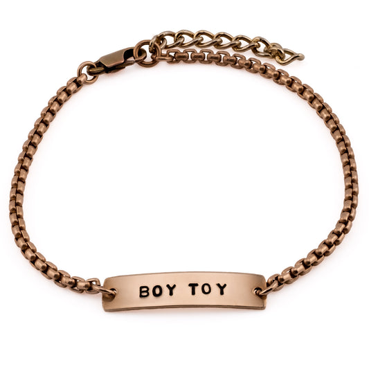 Boy Toy bronze hand-stamped pride bracelet, handmade LGBTQ+ jewelry Austin TX