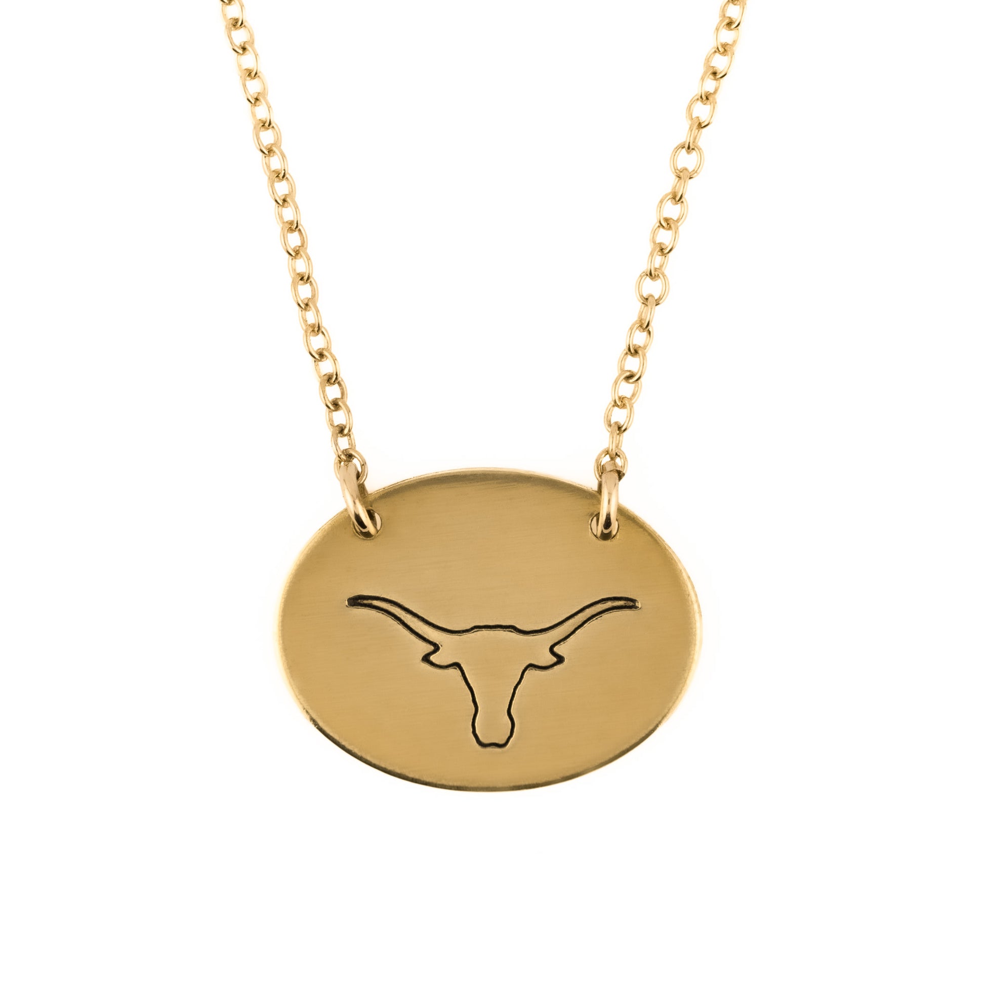 Gold necklace with a round pendant featuring a longhorn design on a white background