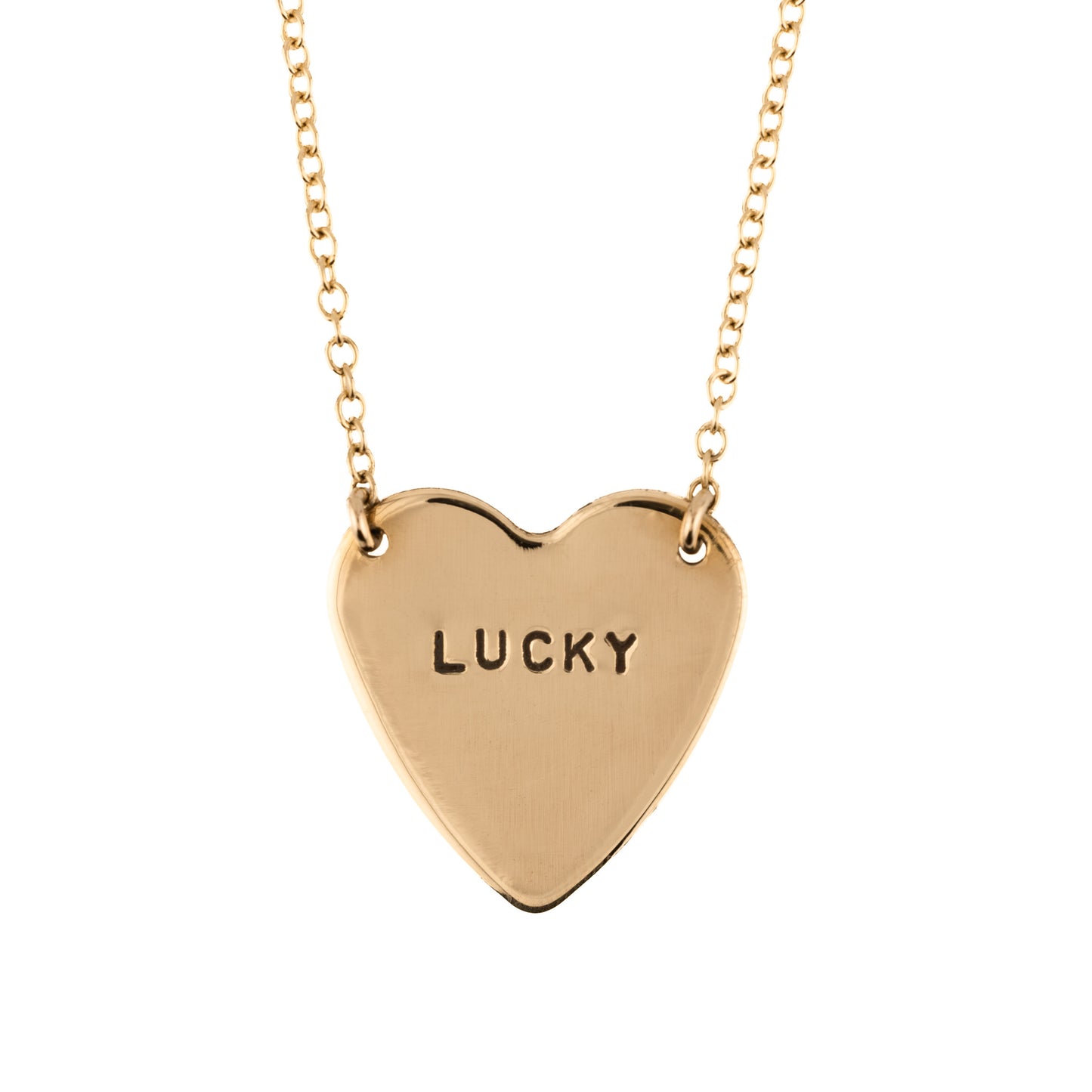 Gold heart-shaped necklace with 'LUCKY' engraving on a white background
