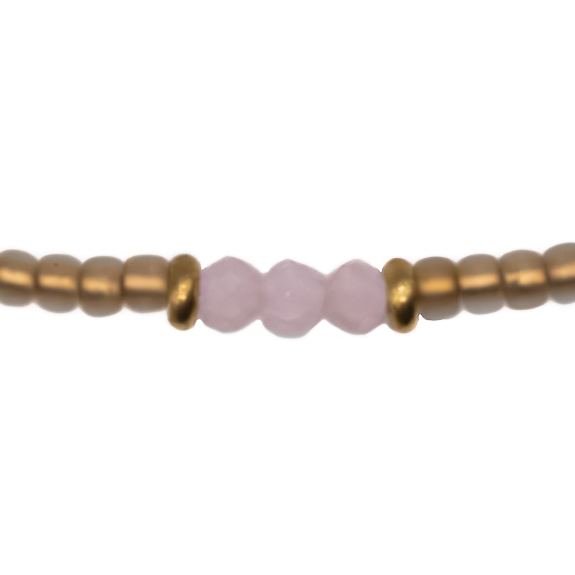 Close up of handmade Tan Gold and Light Pink Seed Bead Anklet, durable glass beads in light pink and soft tan gold with gold accents, made in Austin TX