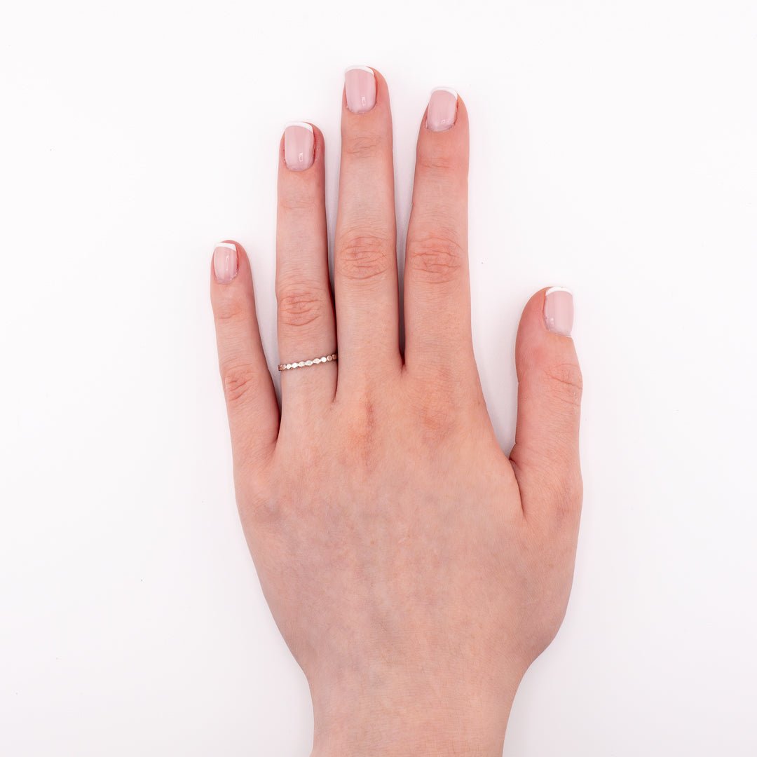 Sterling silver Tiny Bubbles stacking ring worn on hand, dainty bubble texture jewelry for everyday wear