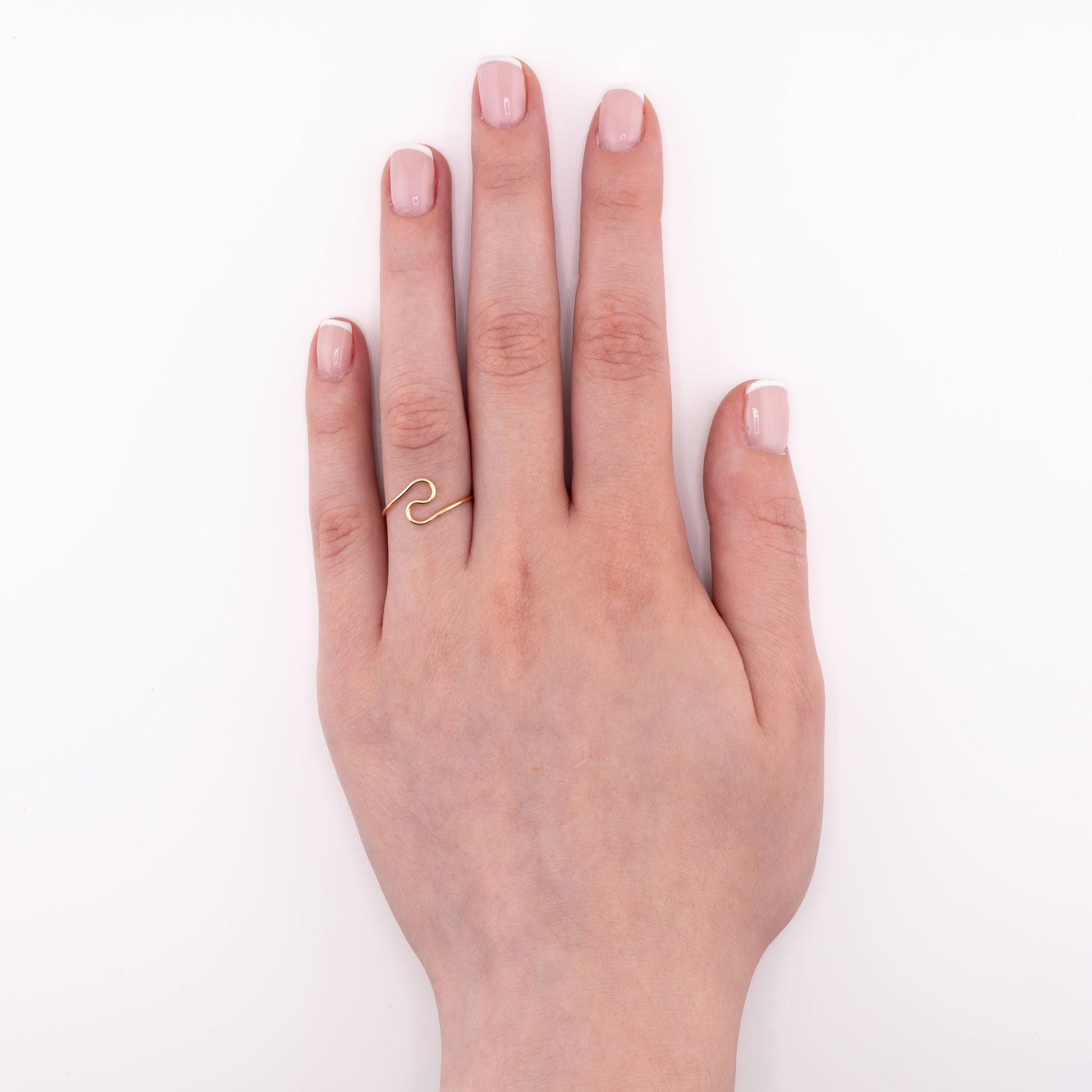 14k gold-filled Wave stacking ring worn on hand, water-safe minimalist ocean jewelry for everyday stacking
