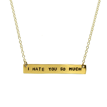 A gold-filled chain necklace with the text 'I HATE YOU SO MUCH' stamped in capital letters.
