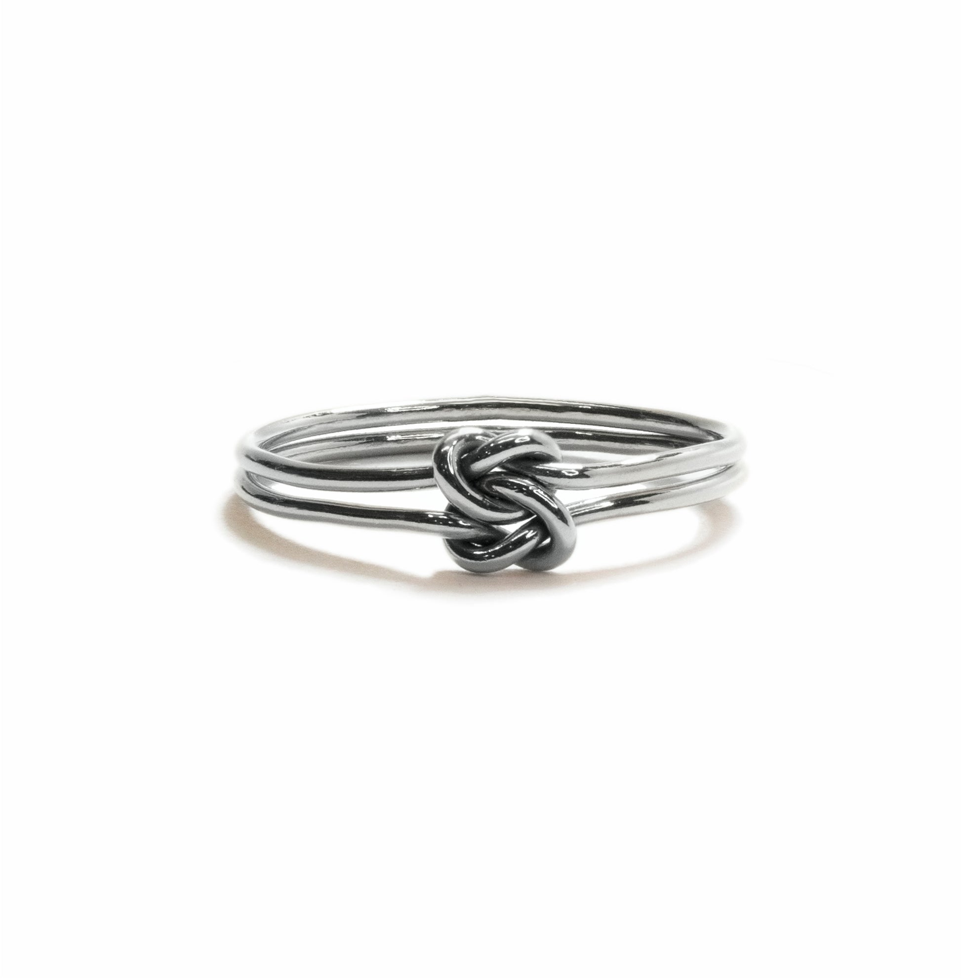 Love Knot stacking ring in sterling silver, handmade symbolic knot design for everyday wear