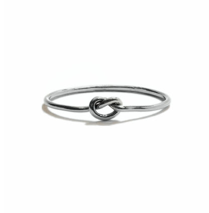 Tiny Knot stacking ring in sterling silver, simple minimalist handmade knot design for everyday wear